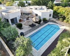 The outdoor area and pool - The Caesarea Estate